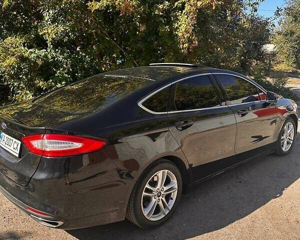 Чорний Форд Мондео, об'ємом двигуна 2 л та пробігом 195 тис. км за 12500 $, фото 6 на Automoto.ua