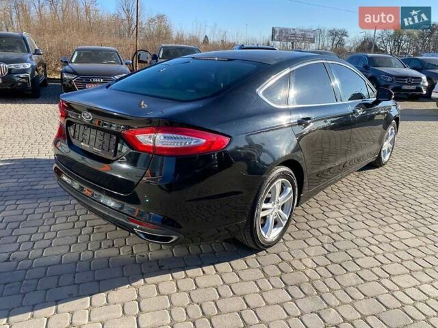 Черный Форд Мондео, объемом двигателя 2 л и пробегом 131 тыс. км за 9900 $, фото 7 на Automoto.ua