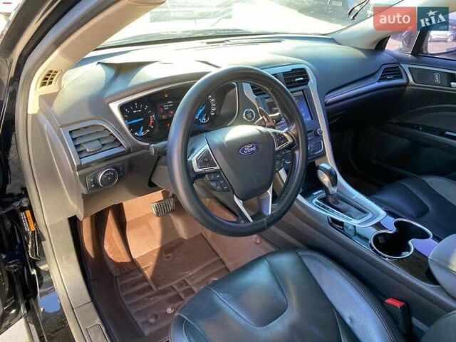 Черный Форд Мондео, объемом двигателя 2 л и пробегом 131 тыс. км за 9900 $, фото 11 на Automoto.ua