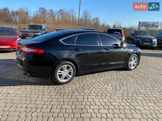 Черный Форд Мондео, объемом двигателя 2 л и пробегом 131 тыс. км за 9900 $, фото 8 на Automoto.ua