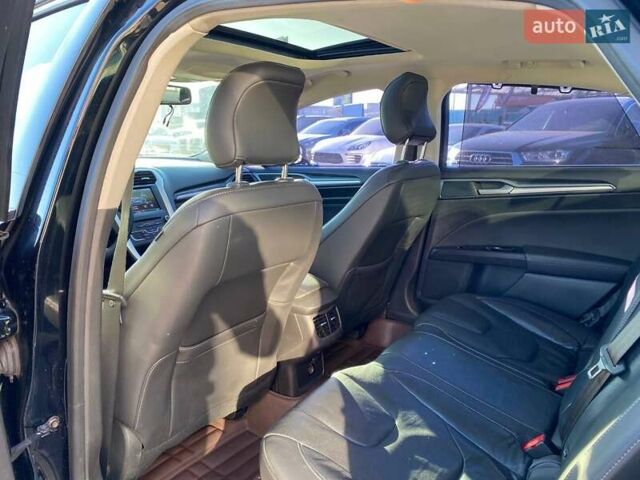 Черный Форд Мондео, объемом двигателя 2 л и пробегом 131 тыс. км за 9900 $, фото 22 на Automoto.ua