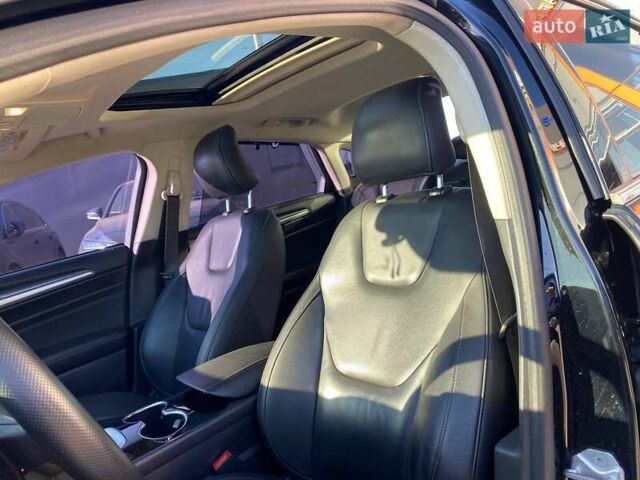 Черный Форд Мондео, объемом двигателя 2 л и пробегом 131 тыс. км за 9900 $, фото 20 на Automoto.ua