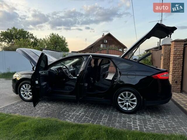 Черный Форд Мондео, объемом двигателя 2 л и пробегом 174 тыс. км за 12300 $, фото 24 на Automoto.ua