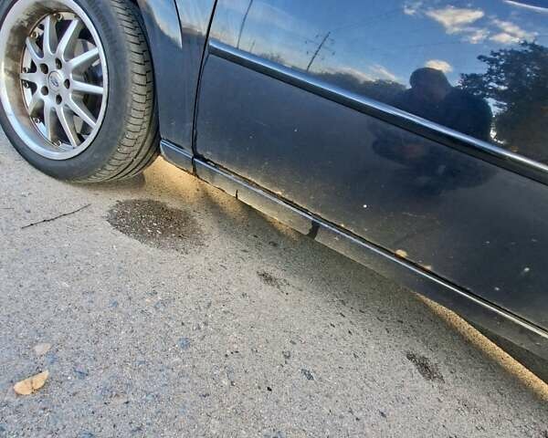 Черный Форд Мондео, объемом двигателя 2 л и пробегом 208 тыс. км за 4500 $, фото 18 на Automoto.ua