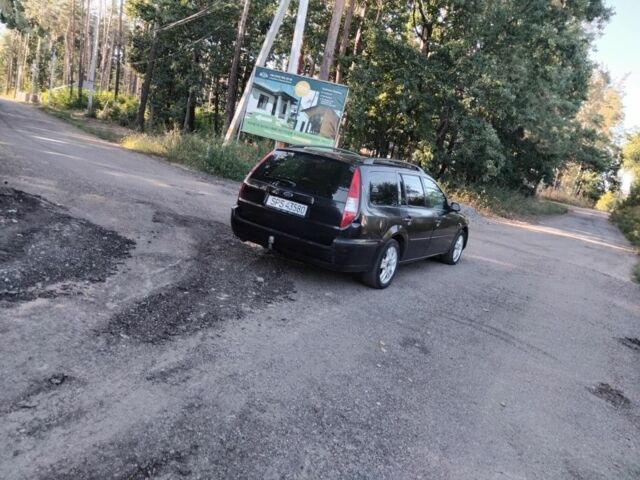 Черный Форд Мондео, объемом двигателя 2 л и пробегом 230 тыс. км за 1450 $, фото 7 на Automoto.ua