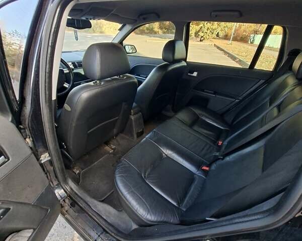 Черный Форд Мондео, объемом двигателя 2 л и пробегом 208 тыс. км за 4500 $, фото 10 на Automoto.ua