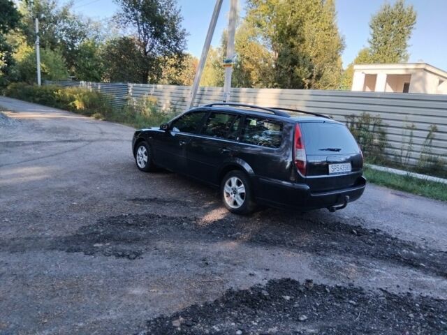 Черный Форд Мондео, объемом двигателя 2 л и пробегом 230 тыс. км за 1450 $, фото 3 на Automoto.ua