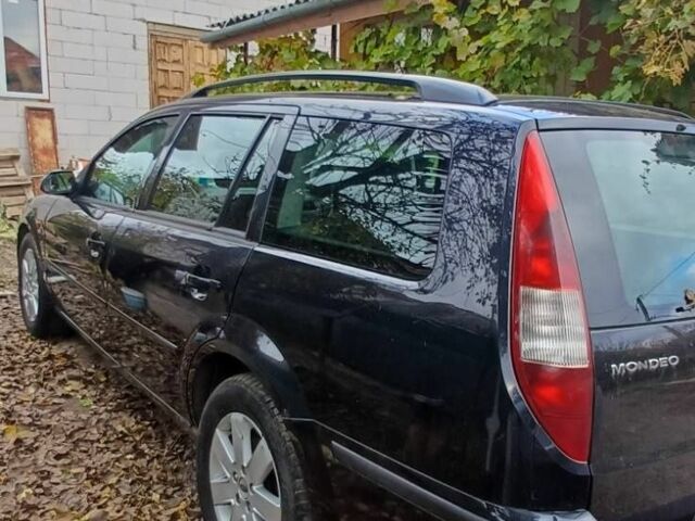 Черный Форд Мондео, объемом двигателя 2 л и пробегом 311 тыс. км за 1700 $, фото 4 на Automoto.ua