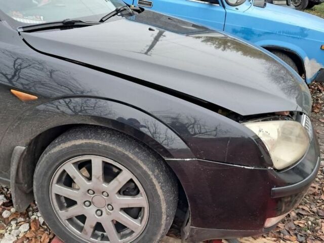 Черный Форд Мондео, объемом двигателя 2 л и пробегом 370 тыс. км за 3500 $, фото 7 на Automoto.ua