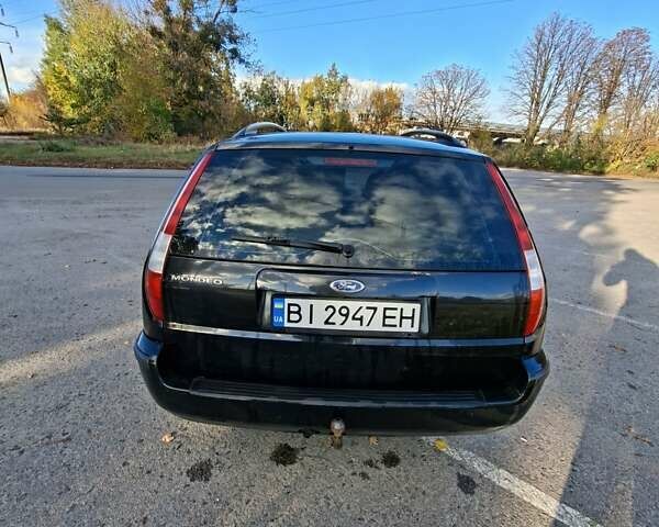 Черный Форд Мондео, объемом двигателя 2 л и пробегом 208 тыс. км за 4500 $, фото 5 на Automoto.ua