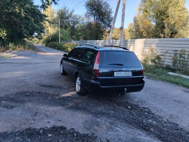 Черный Форд Мондео, объемом двигателя 2 л и пробегом 230 тыс. км за 1450 $, фото 4 на Automoto.ua