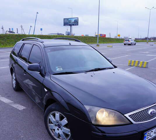 Черный Форд Мондео, объемом двигателя 2 л и пробегом 294 тыс. км за 3899 $, фото 3 на Automoto.ua