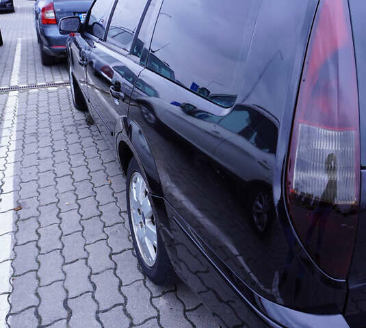 Черный Форд Мондео, объемом двигателя 2 л и пробегом 294 тыс. км за 3899 $, фото 6 на Automoto.ua