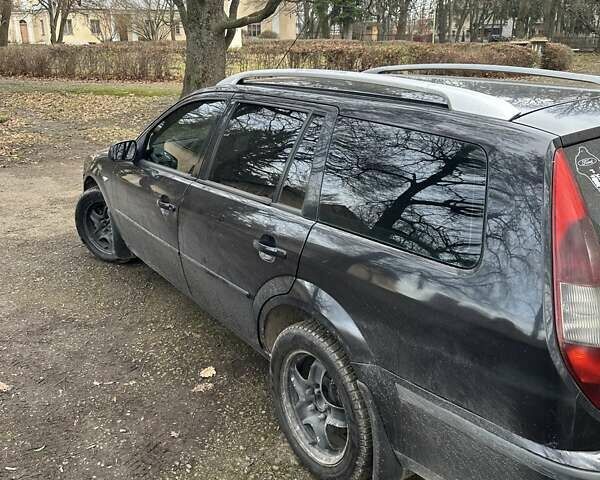 Черный Форд Мондео, объемом двигателя 2 л и пробегом 362 тыс. км за 3500 $, фото 4 на Automoto.ua