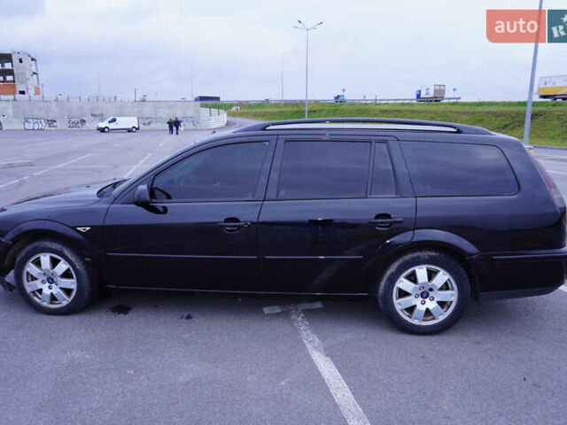 Черный Форд Мондео, объемом двигателя 2 л и пробегом 294 тыс. км за 3899 $, фото 13 на Automoto.ua