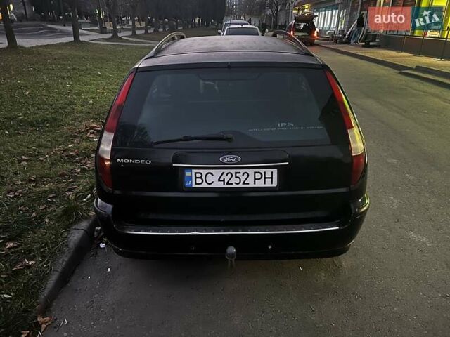 Чорний Форд Мондео, об'ємом двигуна 2 л та пробігом 284 тис. км за 2499 $, фото 13 на Automoto.ua