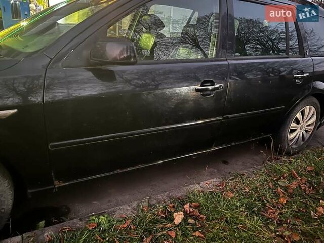 Чорний Форд Мондео, об'ємом двигуна 2 л та пробігом 284 тис. км за 2499 $, фото 9 на Automoto.ua