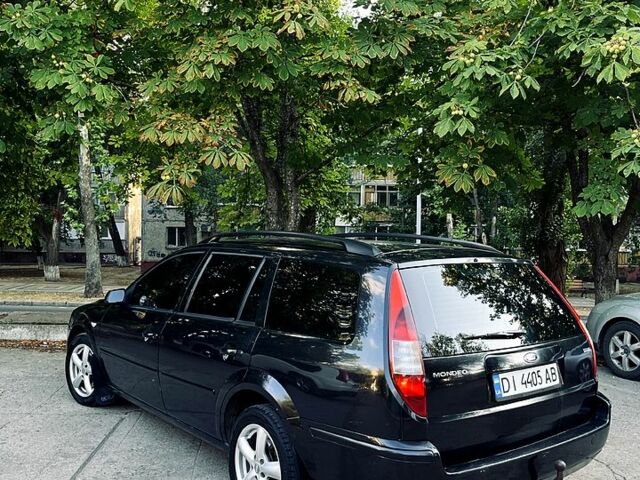 Черный Форд Мондео, объемом двигателя 2 л и пробегом 393 тыс. км за 3500 $, фото 4 на Automoto.ua