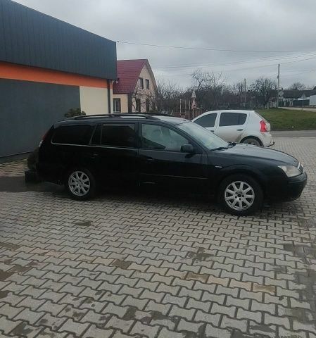 Черный Форд Мондео, объемом двигателя 2 л и пробегом 290 тыс. км за 1750 $, фото 3 на Automoto.ua