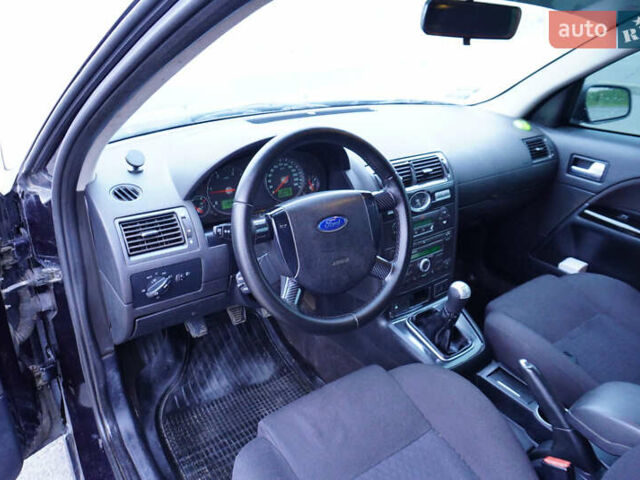 Черный Форд Мондео, объемом двигателя 2 л и пробегом 294 тыс. км за 3899 $, фото 21 на Automoto.ua