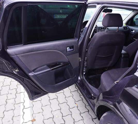 Черный Форд Мондео, объемом двигателя 2 л и пробегом 294 тыс. км за 3899 $, фото 19 на Automoto.ua