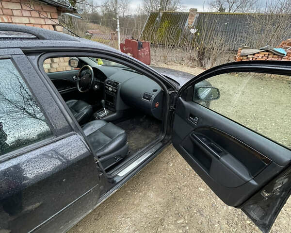 Черный Форд Мондео, объемом двигателя 2 л и пробегом 284 тыс. км за 2600 $, фото 11 на Automoto.ua