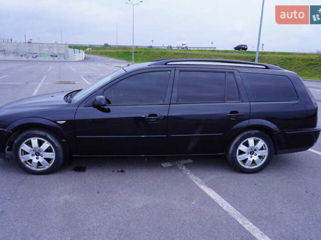 Черный Форд Мондео, объемом двигателя 2 л и пробегом 294 тыс. км за 3899 $, фото 14 на Automoto.ua