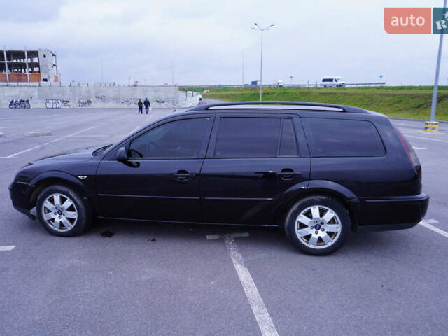 Черный Форд Мондео, объемом двигателя 2 л и пробегом 294 тыс. км за 3899 $, фото 10 на Automoto.ua