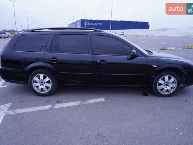 Черный Форд Мондео, объемом двигателя 2 л и пробегом 294 тыс. км за 3899 $, фото 12 на Automoto.ua