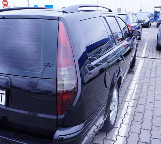 Черный Форд Мондео, объемом двигателя 2 л и пробегом 294 тыс. км за 3899 $, фото 5 на Automoto.ua