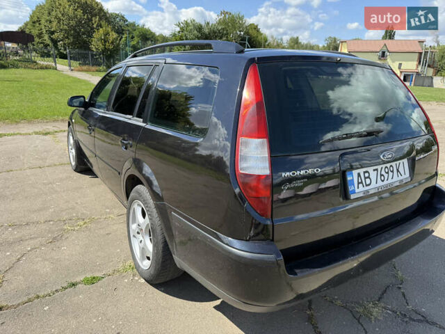 Черный Форд Мондео, объемом двигателя 2 л и пробегом 328 тыс. км за 3800 $, фото 25 на Automoto.ua