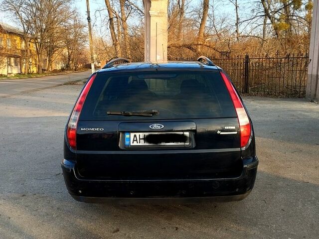 Черный Форд Мондео, объемом двигателя 2 л и пробегом 252 тыс. км за 4500 $, фото 3 на Automoto.ua
