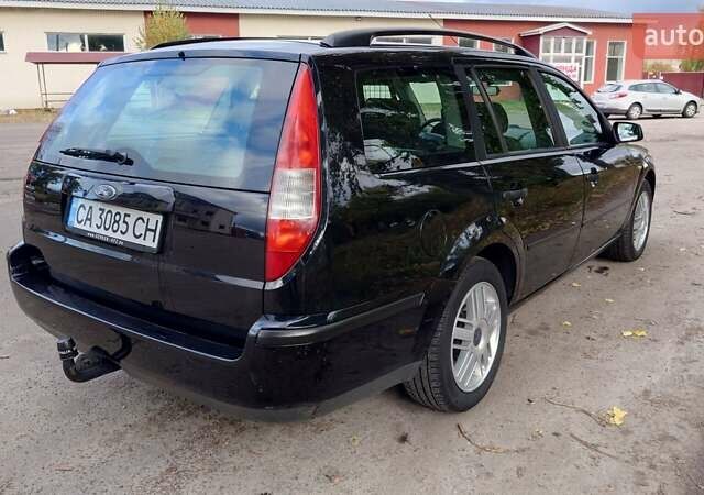 Черный Форд Мондео, объемом двигателя 2 л и пробегом 285 тыс. км за 4600 $, фото 8 на Automoto.ua