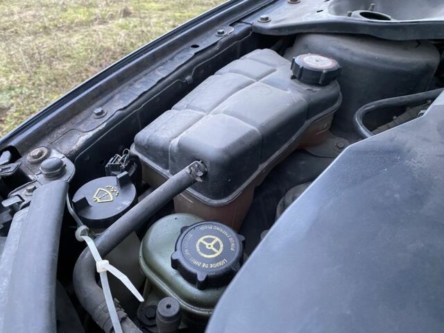 Черный Форд Мондео, объемом двигателя 2 л и пробегом 340 тыс. км за 1390 $, фото 12 на Automoto.ua