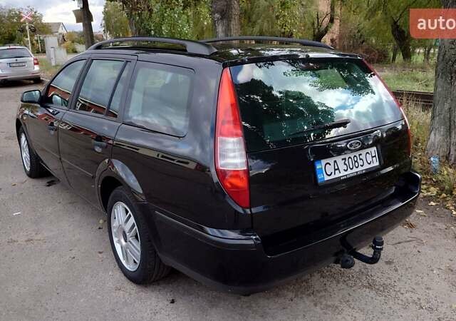 Черный Форд Мондео, объемом двигателя 2 л и пробегом 285 тыс. км за 4600 $, фото 9 на Automoto.ua