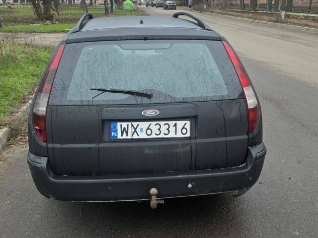 Чорний Форд Мондео, об'ємом двигуна 2 л та пробігом 333 тис. км за 1799 $, фото 6 на Automoto.ua