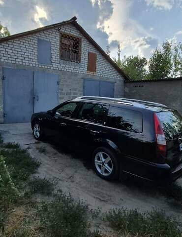 Черный Форд Мондео, объемом двигателя 1.99 л и пробегом 309 тыс. км за 5000 $, фото 7 на Automoto.ua