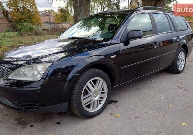 Черный Форд Мондео, объемом двигателя 2 л и пробегом 285 тыс. км за 4600 $, фото 7 на Automoto.ua