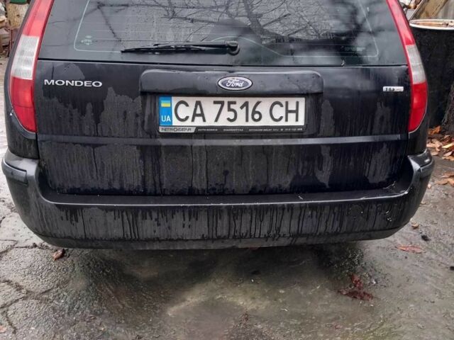Черный Форд Мондео, объемом двигателя 2 л и пробегом 320 тыс. км за 3900 $, фото 2 на Automoto.ua