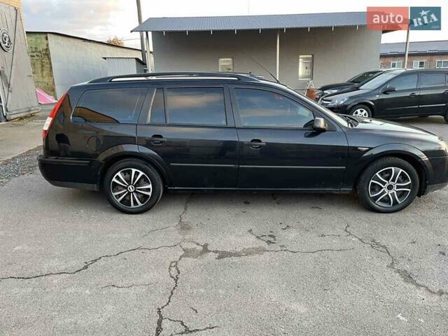 Черный Форд Мондео, объемом двигателя 1.8 л и пробегом 316 тыс. км за 3500 $, фото 6 на Automoto.ua