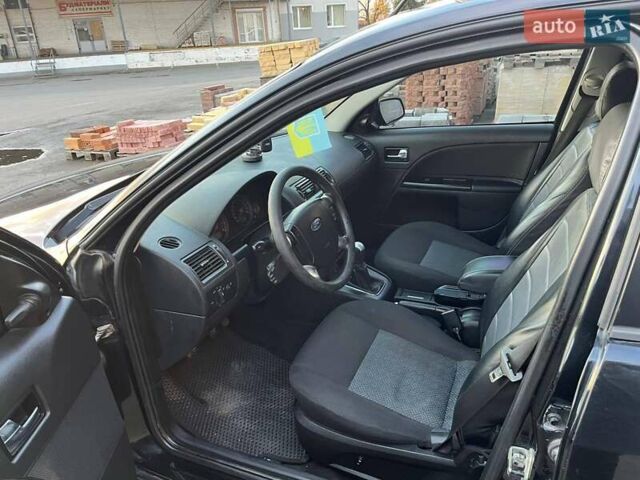 Черный Форд Мондео, объемом двигателя 1.8 л и пробегом 316 тыс. км за 3500 $, фото 11 на Automoto.ua