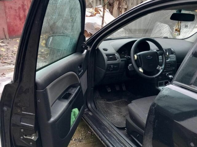 Черный Форд Мондео, объемом двигателя 2 л и пробегом 320 тыс. км за 3900 $, фото 4 на Automoto.ua