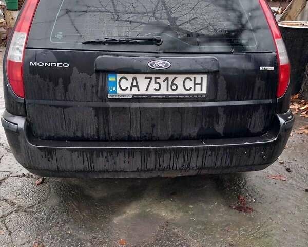Черный Форд Мондео, объемом двигателя 2 л и пробегом 320 тыс. км за 3900 $, фото 1 на Automoto.ua