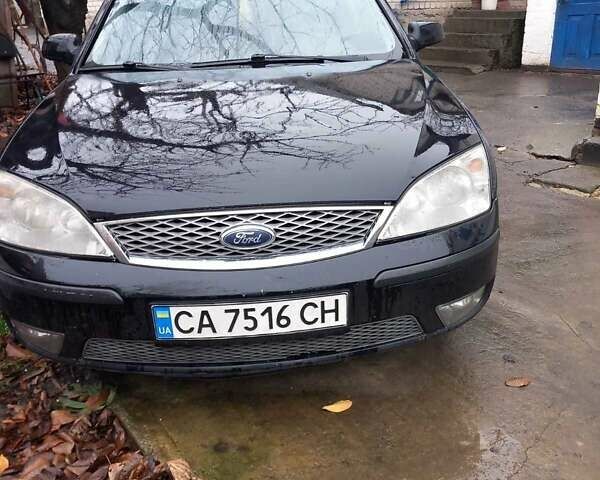 Черный Форд Мондео, объемом двигателя 2 л и пробегом 320 тыс. км за 3900 $, фото 5 на Automoto.ua