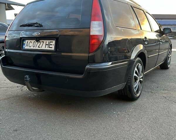 Черный Форд Мондео, объемом двигателя 1.8 л и пробегом 316 тыс. км за 3500 $, фото 5 на Automoto.ua
