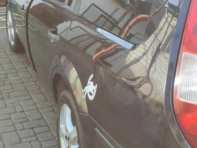 Чорний Форд Мондео, об'ємом двигуна 2 л та пробігом 260 тис. км за 5500 $, фото 6 на Automoto.ua