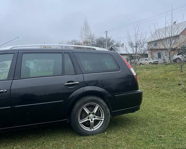 Черный Форд Мондео, объемом двигателя 2 л и пробегом 250 тыс. км за 3135 $, фото 3 на Automoto.ua