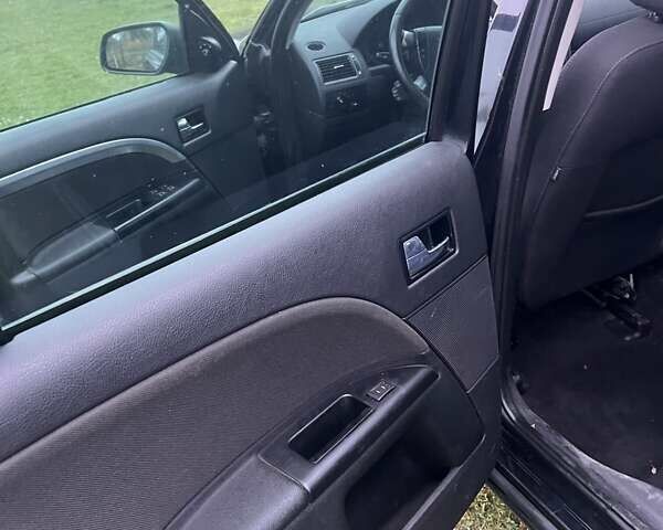 Черный Форд Мондео, объемом двигателя 2 л и пробегом 250 тыс. км за 3135 $, фото 14 на Automoto.ua