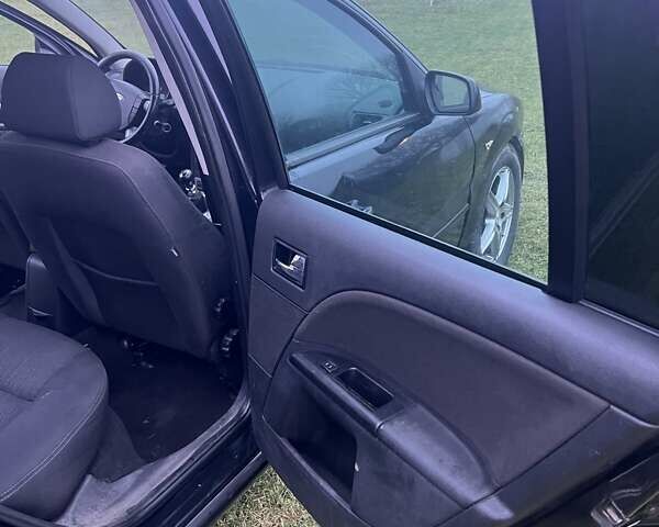 Черный Форд Мондео, объемом двигателя 2 л и пробегом 250 тыс. км за 3135 $, фото 18 на Automoto.ua