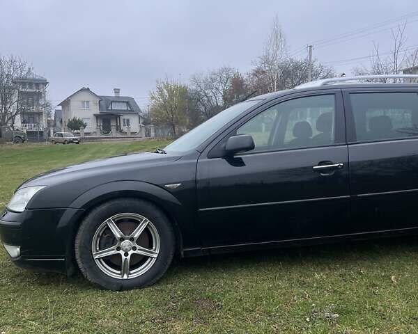 Черный Форд Мондео, объемом двигателя 2 л и пробегом 250 тыс. км за 3135 $, фото 2 на Automoto.ua